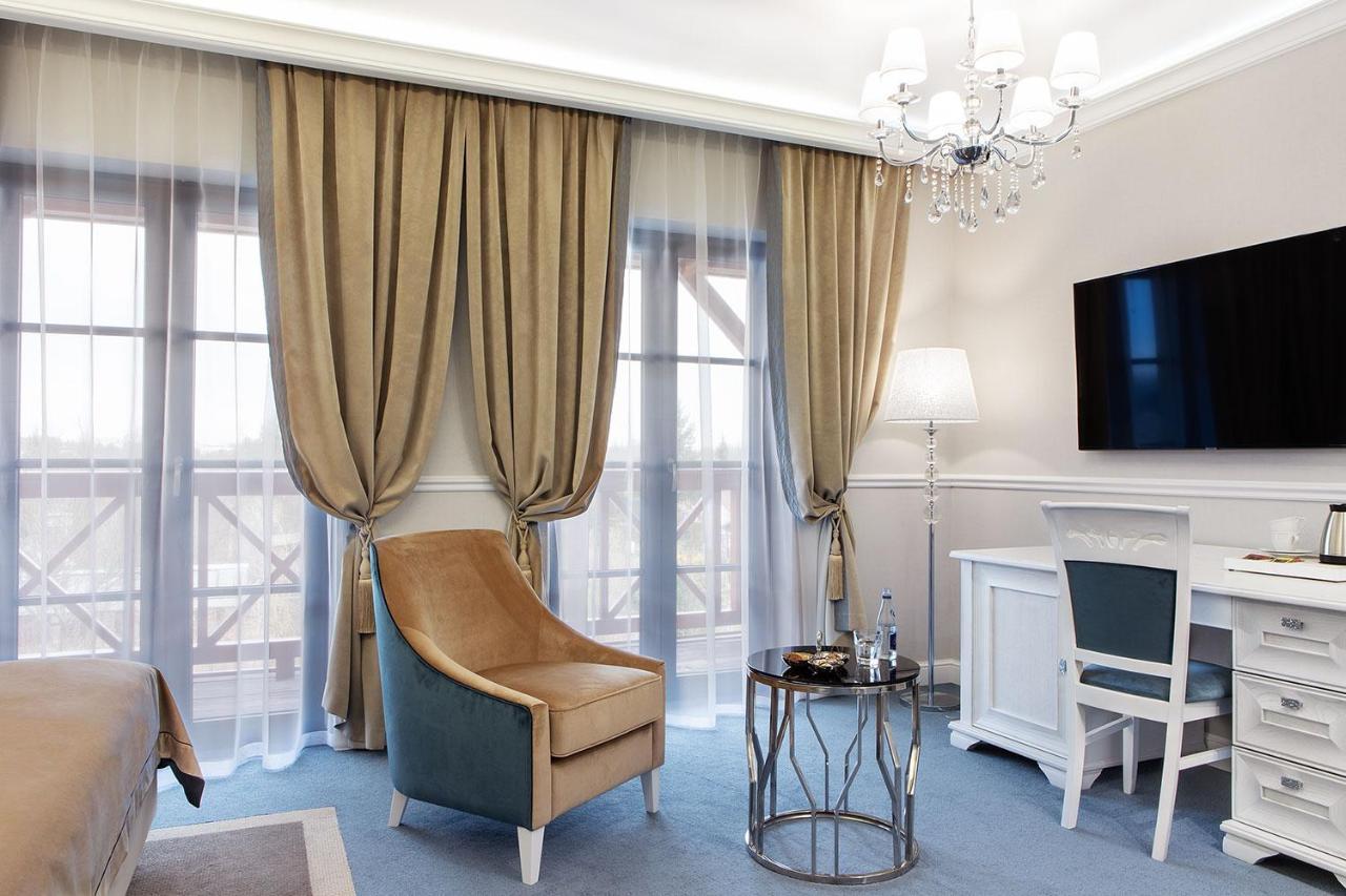 Boutique Odyseja & Spa Цехоцинек Екстериор снимка A room at the hotel