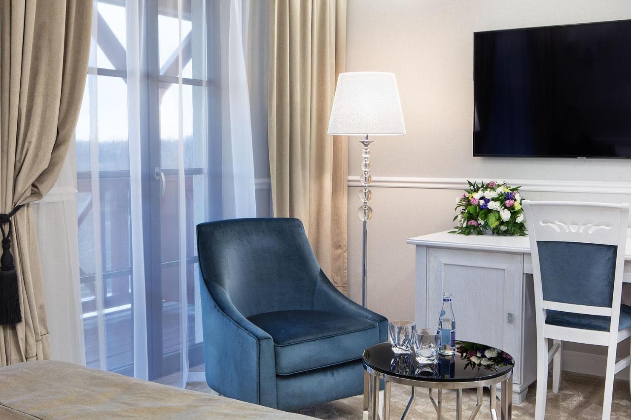 Boutique Odyseja & Spa Цехоцинек Екстериор снимка A room at the hotel