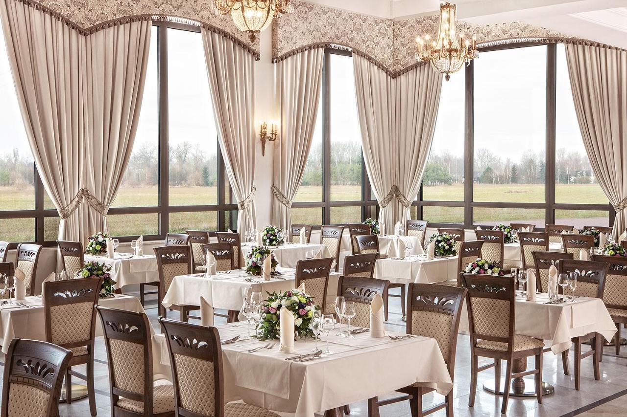 Boutique Odyseja & Spa Цехоцинек Екстериор снимка Restaurant